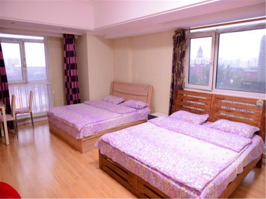 Green Express Apartment Harbin West Railway Station Харбін Номер фото